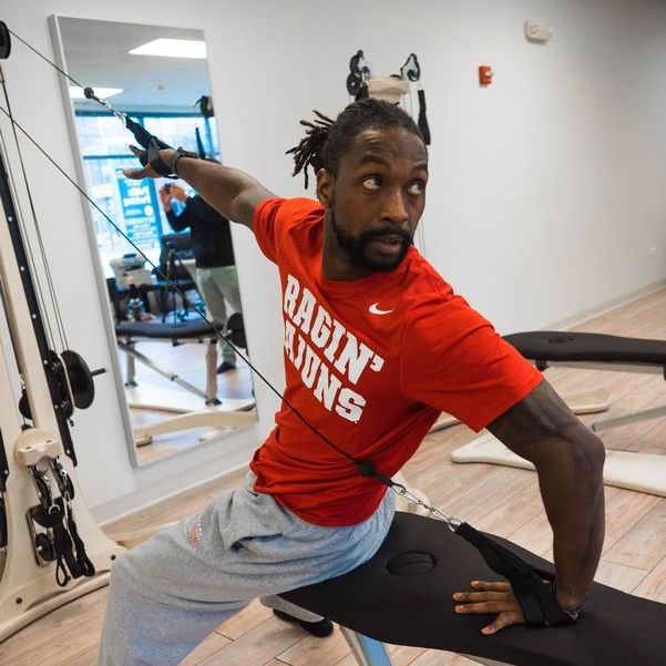 Charles Tillman doing Gyrotonic Exercise on the Gyrotonic Pulley Tower