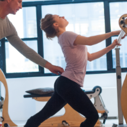 Sara Mearns doing Gyrotonic Exercise on the Gyrotonic Jumping Stretching Board